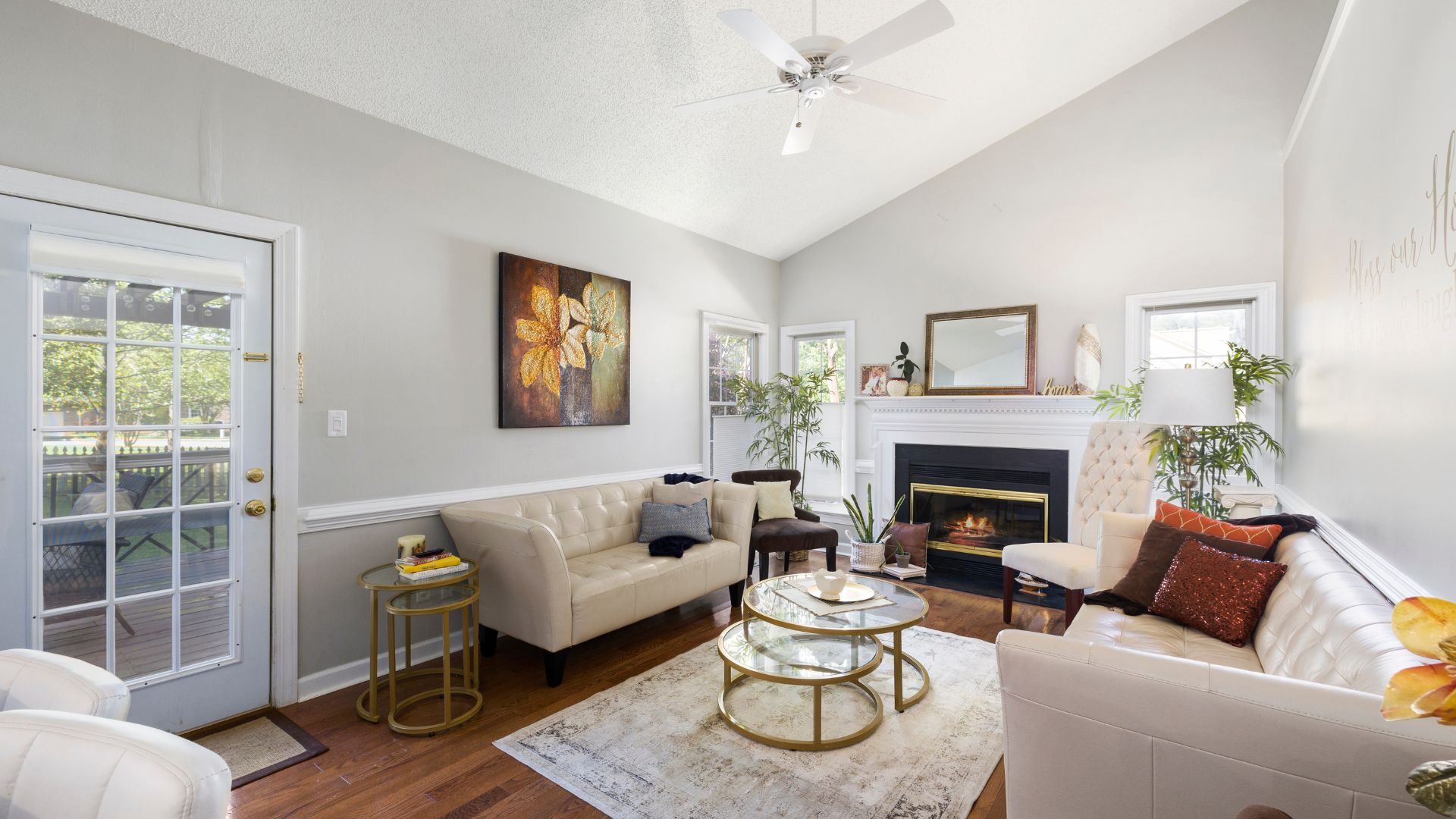 A living room filled with furniture and a fire place